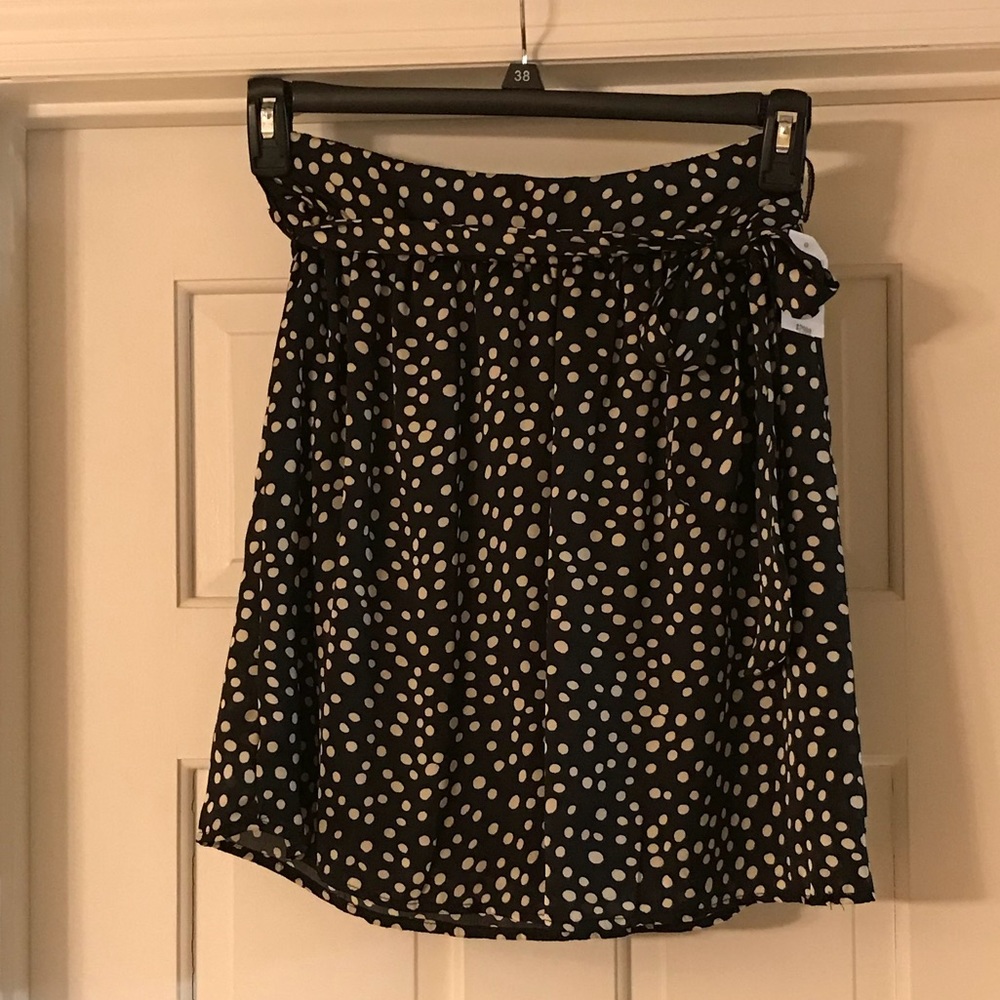 Flowy polk a dot skirt.